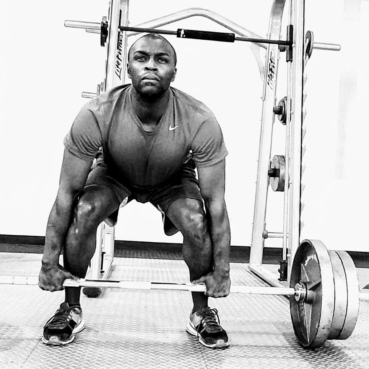 Trainer Christopher Brooks showing how to Deadlift a Barbell